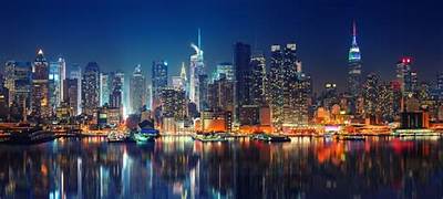 Panoramic view of New York City skyline at night